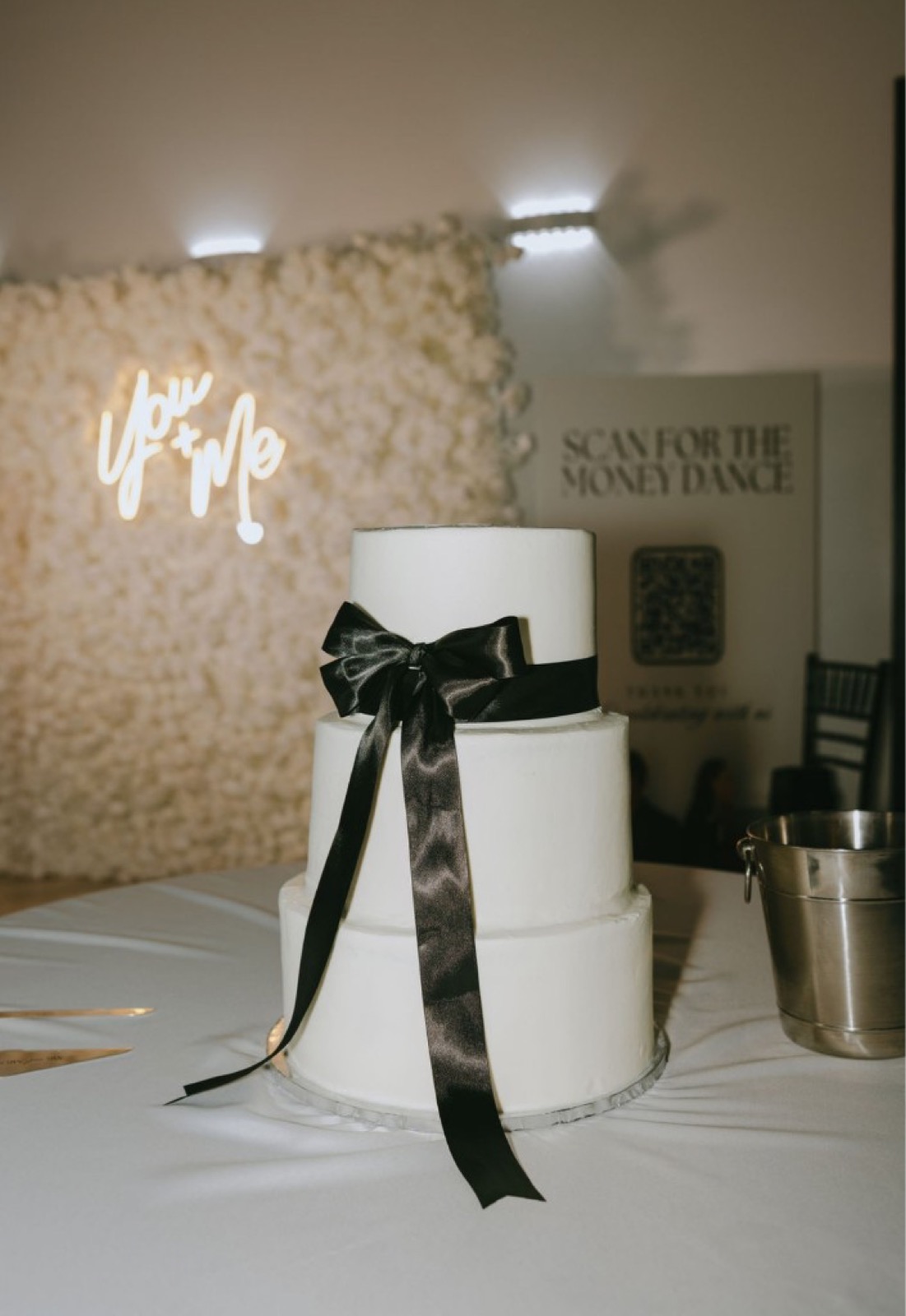 Elegant proposal with floral wall and neon signage