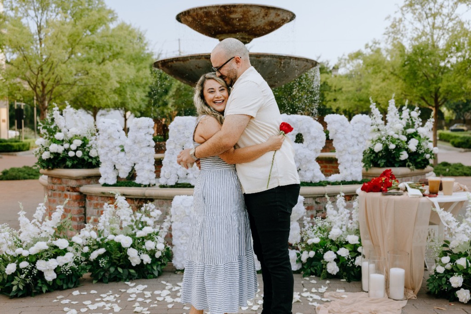 Bespoke fountain proposal with floral Marry Me letters